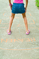 eStockPhoto Stock Photo Of Young Girl Playing Hopscotch