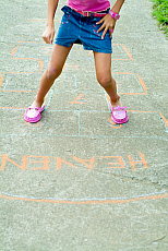 eStockPhoto Stock Photo Of Young Girl Playing Hopscotch
