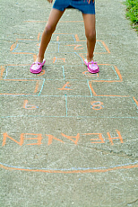 eStockPhoto Stock Photo Of Young Girl Playing Hopscotch