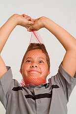 eStockPhoto Boy Hand Over Mouth Stock Photo