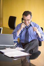 Quality stock photography from estockphoto of executive celebration